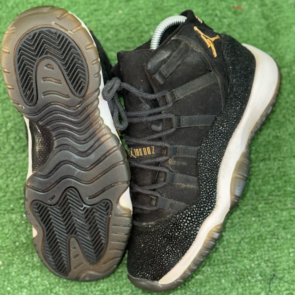 Jordan Black and Gold High-Top Sneakers with Textured Outsole